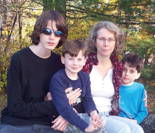 Kathryn Gandek-Tighe ’84 and children (from left) Greg, 14; twins Eric and Chris, 9