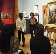 Premed students discuss a nineteenth-century painting