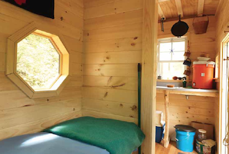 Mary C. Murphy ’05 with her tiny house (interior)