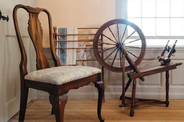 Spinning wheel and chair in Sycamores