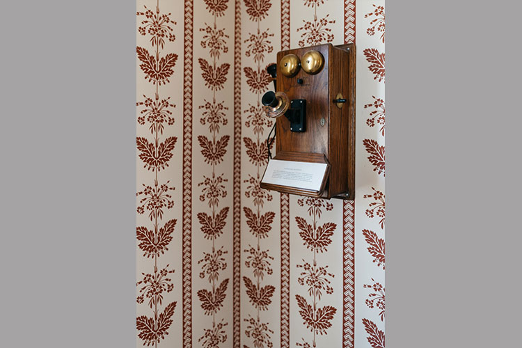 Old telephone in Sycamores mounted on wall