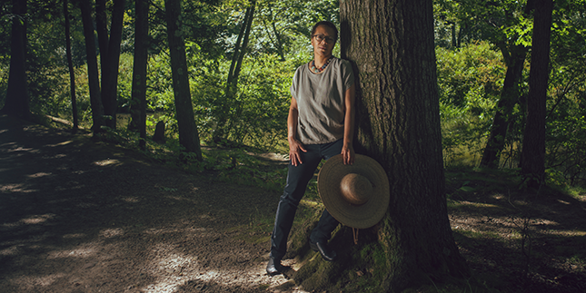 Professor Lauret Savoy in the woods near Upper Lake on the Mount Holyoke campus.
