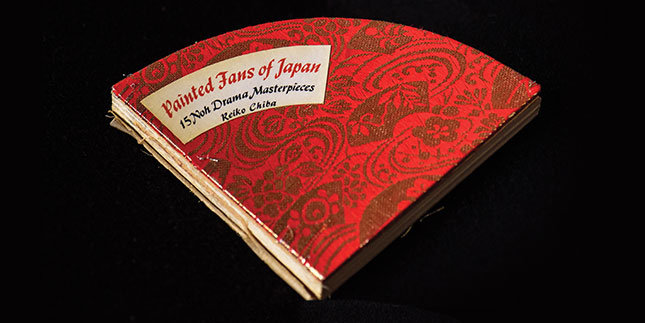 Pie-shaped book with red cover